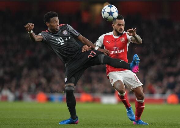 David Alaba of Bayern Munich battles with Theo Walcott of Arsenal during the UEFA Champions League Round of 16 Game 2 match between Arsenal and Bayern Munich at the Emirates Stadium, London, England on 7 March 2017. Copyright: xVincexMignottx 14440028