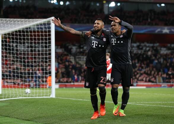 Munich s Arturo Vidal celebrates soring his sides fifth goal during the Champions League Round of 16 match at the Emirates Stadium, London. Picture date March 7th, 2017 Pic David Klein Sportimage EDITORIAL USE ONLY. No use with unauthorised audio, video, data, fixture lists, club league logos or live services. Online in-match use limited to 120 images, no video emulation. No use in betting, games or single club league player publications.