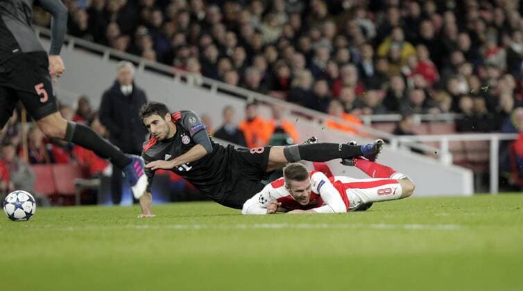 March 7th 2017, Emirates Stadium, London England; UEFA Champions League football, Arsenal FC versus Bayern Munich; Aaron Ransey (FC Arsenal) and Javi Martinez ( Bayern Munich) challenge for the ball xLaurentxLairysx  ActionPlus11854321