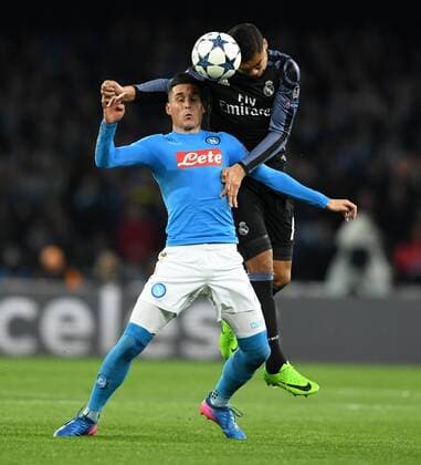 NAPLES, March 7, 2017 -- Jose Callejon(L) of Napoli vies with Casemiro of Real Madrid during the UEFA Champions League Round of 16 second leg match between Napoli and Real Madrid in Naples, Italy, March 7, 2017. Real Madrid won 3-1 advanced to the quarterfinal with 6-2 on aggregate. ) (SP)ITALY-NAPLES-SOCCER-UEFA-UCL-REAL MADRID VS NAPOLI AlbertoxLingria 