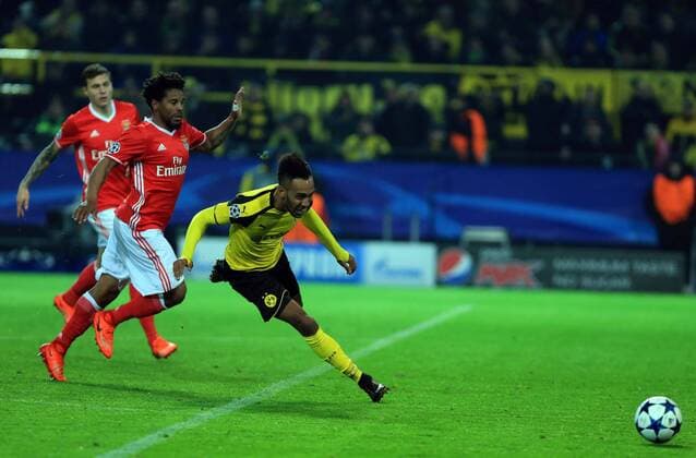 DORTMUND, March 8, 2017 -- Pierre-Emerick Aubameyang (R) of Borussia Dortmund chases the ball during the UEFA Champions League Round of 16 second leg match between Borussia Dortmund and SL Benfica at Signal Iduna Park in Dortmund, Germany, on March 8, 2017. Borussia Dortmund won 4-0 and advanced to the quarterfinal with 4-1 on aggregate. ) (SP)GERMANY-DORTMUND-SOCCER-UEFA-UCL-DORTMUND VS BENFICA LuoxHuanhuan 