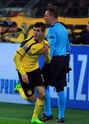 DORTMUND, March 8, 2017 -- Christian Pulisic of Borussia Dortmund celebrates scoring during the UEFA Champions League Round of 16 second leg match between Borussia Dortmund and SL Benfica at Signal Iduna Park in Dortmund, Germany, on March 8, 2017. Borussia Dortmund won 4-0 and advanced to the quarterfinal with 4-1 on aggregate. ) (SP)GERMANY-DORTMUND-SOCCER-UEFA-UCL-DORTMUND VS BENFICA LuoxHuanhuan 