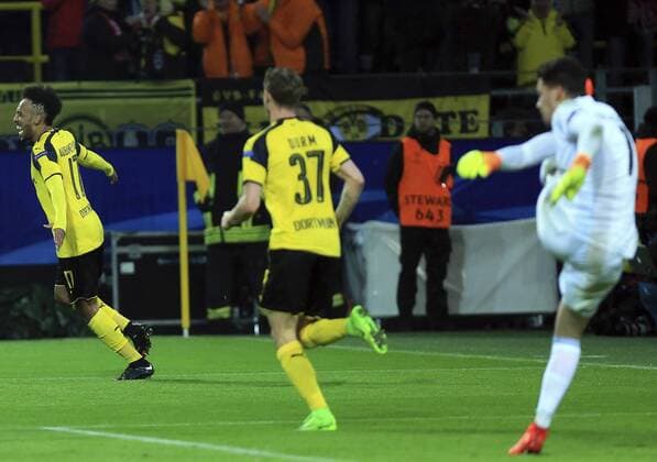 DORTMUND, March 8, 2017 -- Pierre-Emerick Aubameyang (L)of Borussia Dortmund celebrates after scoring during the UEFA Champions League Round of 16 second leg match between Borussia Dortmund and SL Benfica at Signal Iduna Park in Dortmund, Germany, on March 8, 2017. Borussia Dortmund won 4-0 and advanced to the quarterfinal. ) (SP)GERMANY-DORTMUND-SOCCER-UEFA-UCL-DORTMUND VS BENFICA LuoxHuanhuan 