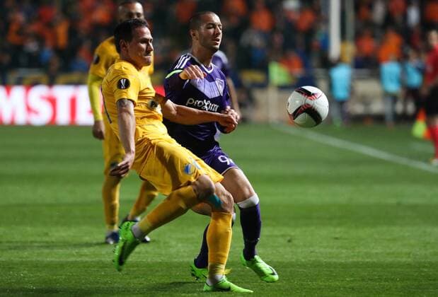 Apoel s Zhivko Milanov and Anderlecht s Sofiane Hanni fight for the ball during a soccer game between Cypriot club APOEL FC and Belgian team RSC Anderlecht in Nicosia, Cyprus, Thursday 09 March 2017, the first leg of the 1 8 finals of the Europa League competition. VIRGINIExLEFOUR  x05061853x