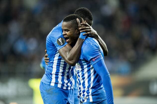 Genk s Omar Colley and Genk s Mwbana Ally Samatta celebrate after scoring during a soccer game between Belgian teams KAA Gent and KRC Genk, Thursday 09 March 2017 in Gent, the first leg of the 1 8 finals of the Europa League competition. JASPERxJACOBS  x05061961x