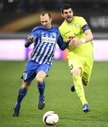 Genk s Thomas Buffel and Gent s Stefan Mitrovic fight for the ball during a soccer game between Belgian teams KAA Gent and KRC Genk, Thursday 09 March 2017 in Gent, the first leg of the 1 8 finals of the Europa League competition. YORICKxJANSENS  x05062053x
