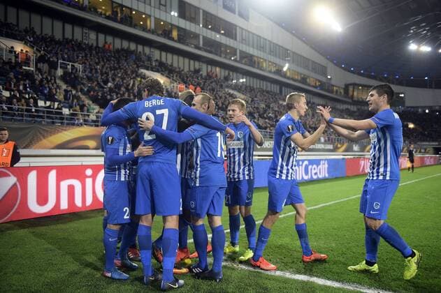 Genk s players celebrate during a soccer game between Belgian teams KAA Gent and KRC Genk, Thursday 09 March 2017 in Gent, the first leg of the 1 8 finals of the Europa League competition. YORICKxJANSENS  x05062068x
