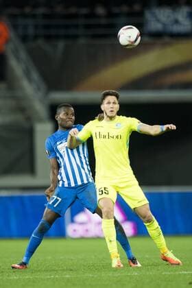 Genk s Mwbana Ally Samatta and Gent s Rami Gershon fight for the ball during a soccer game between Belgian teams KAA Gent and KRC Genk, Thursday 09 March 2017 in Gent, the first leg of the 1 8 finals of the Europa League competition. JASPERxJACOBS  x05062085x