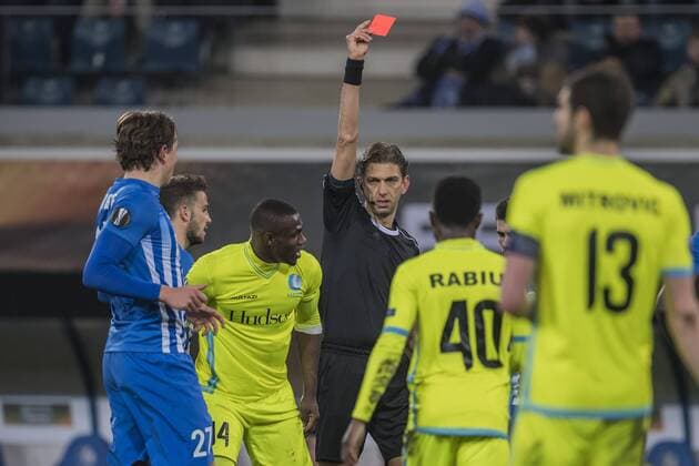 referee Paolo Tagliavento (M) give a red card to Anderson Esiti of KAA Gent (3L)during the UEFA Europa League round of 16 match between KAA Gent and KRC Genk on March 09, 2017 at the Ghelamco Arena in Gent, Belgium. KAA Gent v KRC Genk UEFA Europa League 2016 2017 xVIxGerritxvanxKeulenxIVx 7294625