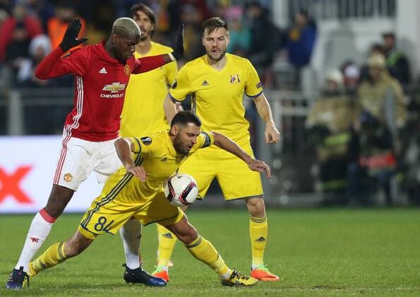 March 9, 2017 - Rostov-On-Don, Russia - Paul Pogba (L) of FC Manchester United ManU and Aleksandr Gatskan of FC Rostov vie for the ball during the UEFA Europa League Round of 16, first leg between FC Manchester United and FC Rostov, at Olimp 2 Stadium in Rostov-on-Don, Russia on March 9, 2017. FK Rostov v Manchester United - UEFA Europa League Round of 16: First Leg  - ZUMAn230 20170309_zaa_n230_250 Copyright: xIgorxRussakx