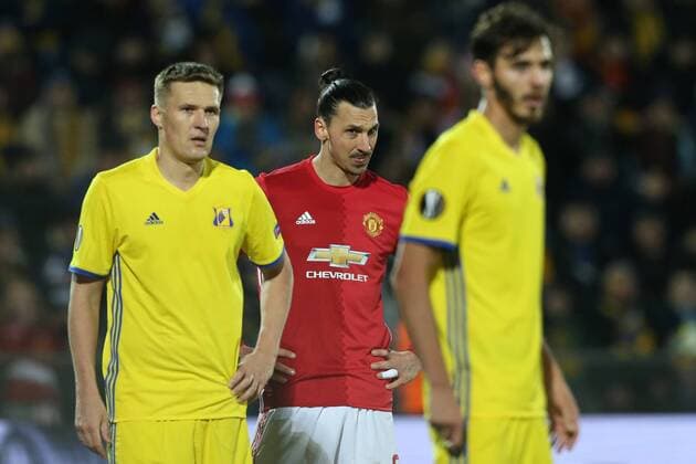 March 9, 2017 - Rostov-On-Don, Russia - Aleksandr Bukharov (L) of FC Rostov and Zlatan Ibrahimovic (C) of FC Manchester United ManU vie for the ball during the UEFA Europa League Round of 16, first leg between FC Manchester United and FC Rostov, at Olimp 2 Stadium in Rostov-on-Don, Russia on March 9, 2017. FK Rostov v Manchester United - UEFA Europa League Round of 16: First Leg  - ZUMAn230 20170309_zaa_n230_272 Copyright: xIgorxRussakx