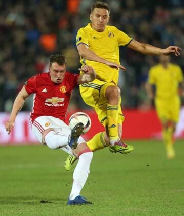 March 9, 2017 - Rostov-On-Don, Russia - Phil Jones (L) of FC Manchester United ManU and Aleksandr Bukharov of FC Rostov vie for the ball during the UEFA Europa League Round of 16, first leg between FC Manchester United and FC Rostov, at Olimp 2 Stadium in Rostov-on-Don, Russia on March 9, 2017. FK Rostov v Manchester United - UEFA Europa League Round of 16: First Leg  - ZUMAn230 20170309_zaa_n230_255 Copyright: xIgorxRussakx