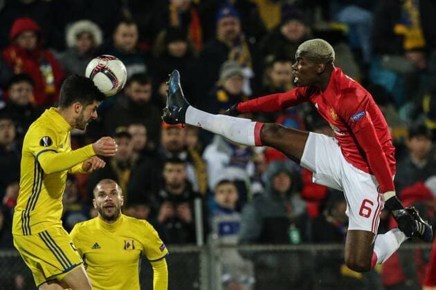 March 9, 2017 - Rostov-On-Don, Russia - Paul Pogba (R) of FC Manchester United ManU and of FC Rostov vie for the ball during the UEFA Europa League Round of 16, first leg between FC Manchester United and FC Rostov, at Olimp 2 Stadium in Rostov-on-Don, Russia on March 9, 2017. FK Rostov v Manchester United - UEFA Europa League Round of 16: First Leg  - ZUMAn230 20170309_zaa_n230_289 Copyright: xIgorxRussakx