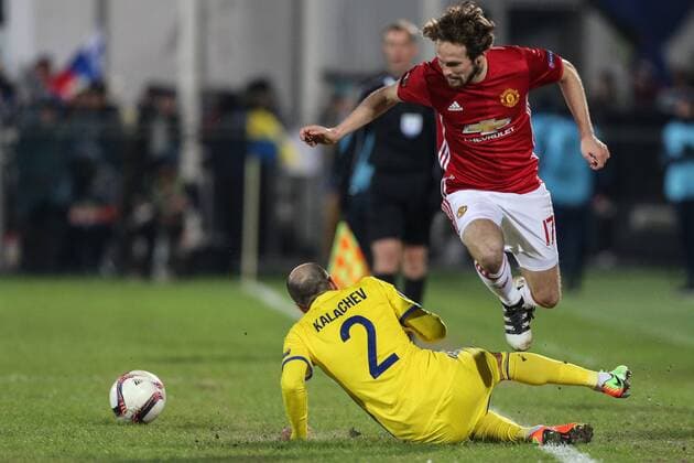 March 9, 2017 - Rostov-On-Don, Russia - Timofei Kalachev (L) of FC Rostov and Daley Blind of FC Manchester United ManU vie for the ball during the UEFA Europa League Round of 16, first leg between FC Manchester United and FC Rostov, at Olimp 2 Stadium in Rostov-on-Don, Russia on March 9, 2017. FK Rostov v Manchester United - UEFA Europa League Round of 16: First Leg  - ZUMAn230 20170309_zaa_n230_258 Copyright: xIgorxRussakx