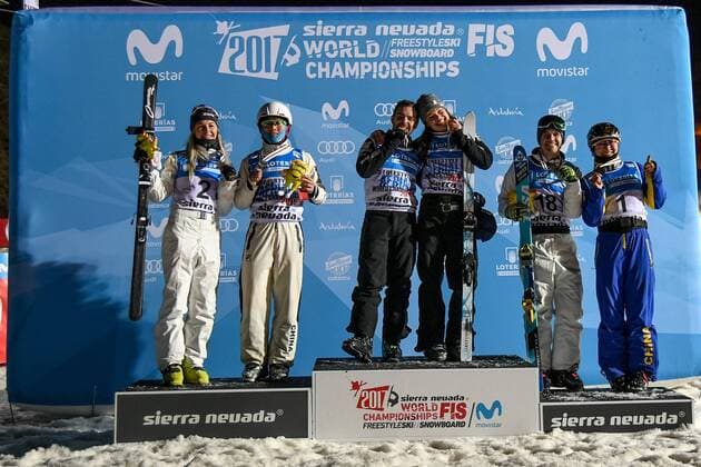SNOWBOARD, FREESTYLE SKIING - FIS WC 2017 SIERRA NEVADA,SPAIN,10.MAR.17 - SNOWBOARD, FREESTYLE SKIING - FIS Freestyle Ski and Snowboard World Championships, free ski aerials, men ladies final, award ceremony. Image shows Danielle Scott (AUS), Guangpu Qi (CHN), Jonathon Lillis, Ashley Caldwell (USA), David Morris (AUS) and Mangtao XU (CHN). GEPAxpictures xOliverxLerch