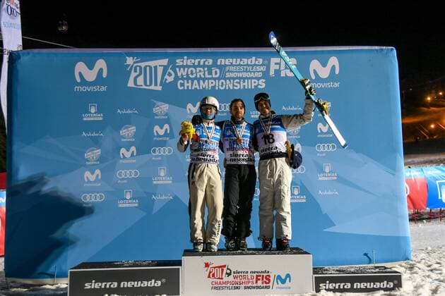 SNOWBOARD, FREESTYLE SKIING - FIS WC 2017 SIERRA NEVADA,SPAIN,10.MAR.17 - SNOWBOARD, FREESTYLE SKIING - FIS Freestyle Ski and Snowboard World Championships, free ski aerials, men ladies finalaward ceremony. Image shows Guangpu Qi (CHN), Jonathon Lillis (USA) and David Morris (AUS). GEPAxpictures xOliverxLerch