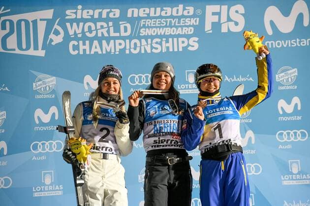 SNOWBOARD, FREESTYLE SKIING - FIS WC 2017 SIERRA NEVADA,SPAIN,10.MAR.17 - SNOWBOARD, FREESTYLE SKIING - FIS Freestyle Ski and Snowboard World Championships, free ski aerials, men ladies final, award ceremony. Image shows the rejoicing of Danielle Scott (AUS), Ashley Caldwell (USA) and Mangtao XU (CHN). GEPAxpictures xOliverxLerch