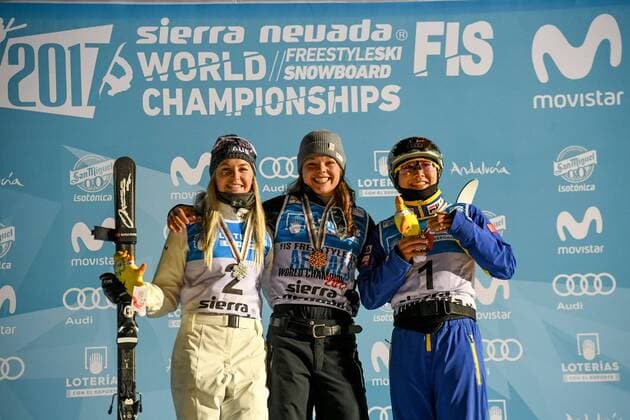 SNOWBOARD, FREESTYLE SKIING - FIS WC 2017 SIERRA NEVADA,SPAIN,10.MAR.17 - SNOWBOARD, FREESTYLE SKIING - FIS Freestyle Ski and Snowboard World Championships, free ski aerials, men ladies final, award ceremony. Image shows the rejoicing of Danielle Scott (AUS), Ashley Caldwell (USA) and Mangtao XU (CHN). GEPAxpictures xOliverxLerch