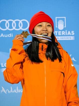 SNOWBOARD, FREESTYLE SKIING - FIS WC 2017 SIERRA NEVADA,SPAIN,11.MAR.17 - SNOWBOARDING - FIS Freestyle Ski and Snowboard World Championships, snowboard halfpipe, finals, ladies, award ceremony. Image shows the rejoicing of Xuetong Cai (CHN). Keywords: medal. GEPAxpictures xOliverxLerch