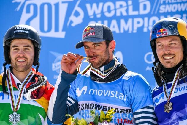 Bilder des Tages - SPORT SNOWBOARD, FREESTYLE SKIING - FIS WC 2017 SIERRA NEVADA,SPAIN,12.MAR.17 - SNOWBOARDING - FIS Freestyle Ski and Snowboard World Championships, SBX, Snowboard Cross, final, ladies men, award ceremony. Image shows Lucas Eguibar (ESP), Pierre Vaultier (FRA) and Alex Pullin (AUS). Keywords: medal. GEPAxpictures xOliverxLerch
