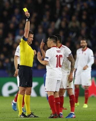 Football - 2016 2017 UEFA Champions League - Round of Sixteen, Second Leg: Leicester City 1 vs. Sevilla 2 Samir Nasri of Sevilla is booked during the match at the King Power Stadium. 