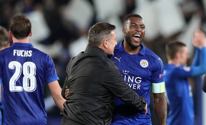 Fußball, CL, Leicester City - FC Sevilla Football - 2016 2017 UEFA Champions League - Round of Sixteen, Second Leg: Leicester City 1 vs. Sevilla 2 Craig Shakespeare, Manager of Leicester City celebrates with Wes Morgan of Leicester City after the match at the King Power Stadium. 