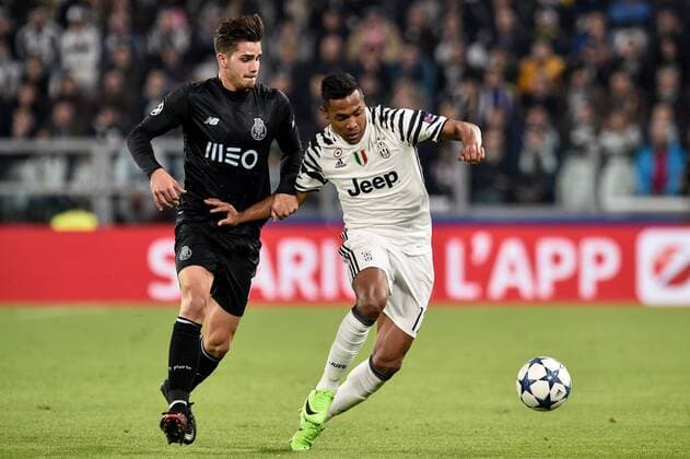 Alex Sandro of Juventus is chalenged by AndrŽ Silvaduring the UEFA Champions League Round of 16 game 2 match between Juventus and Porto at the Juventus Stadium, Turin, Italy on 14 March 2017. Copyright: xGiuseppexMaffiax 14610015