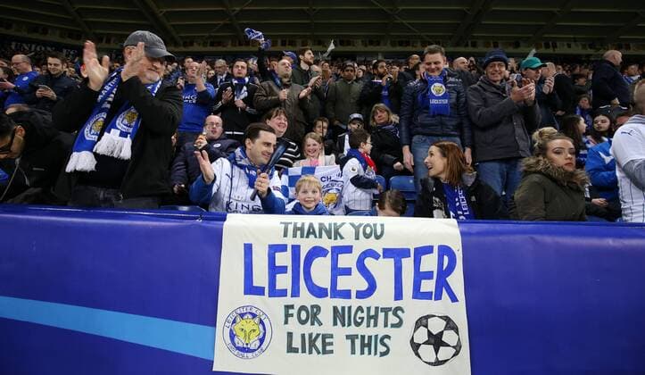 Football - 2016 2017 UEFA Champions League - Round of Sixteen, Second Leg: Leicester City 1 vs. Sevilla 2 Fans of Leicester City celebrate during the match at the King Power Stadium. 
