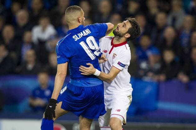 March 14th 2017, King Power Stadium, Leicester, England; UEFA Champions League Football 2nd Leg, Leicester City versus Seville; Islam Slimani of Leicester City tussles with Nicolas Pareja of Sevilla xGrahamxWilsonx  ActionPlus11856276