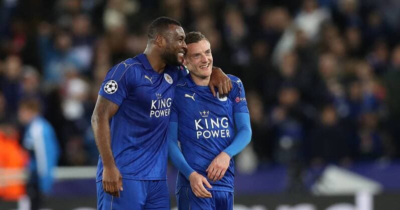 Football - 2016 2017 UEFA Champions League - Round of Sixteen, Second Leg: Leicester City 1 vs. Sevilla 2 Wes Morgan and Jamie Vardy of Leicester City celebrate after the match at the King Power Stadium. 