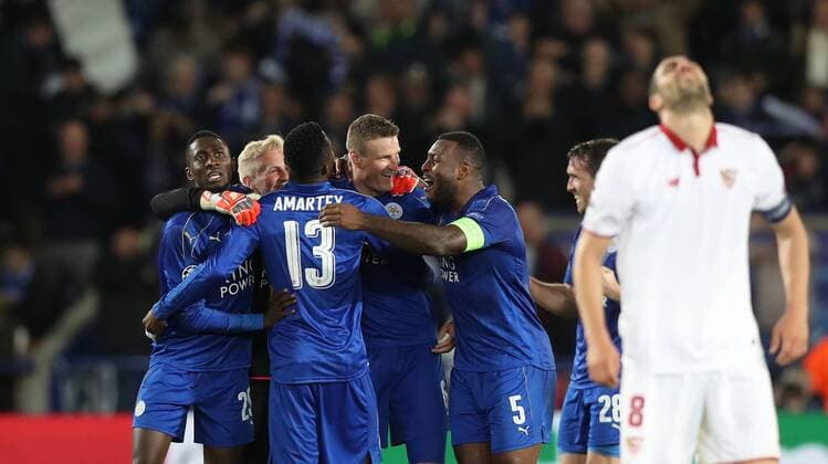 Football - 2016 2017 UEFA Champions League - Round of Sixteen, Second Leg: Leicester City 1 vs. Sevilla 2 Leicester City celebrate after the match at the King Power Stadium. 