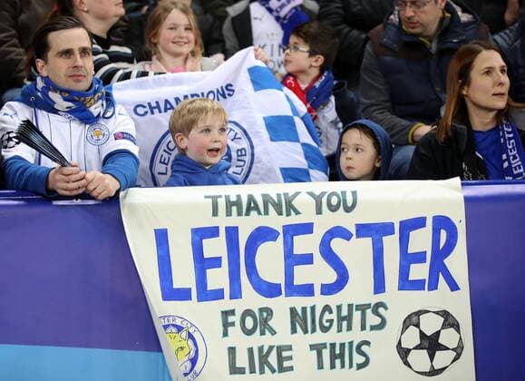 Football - 2016 2017 UEFA Champions League - Round of Sixteen, Second Leg: Leicester City 1 vs. Sevilla 2 Fans of Leicester City celebrate during the match at the King Power Stadium. 