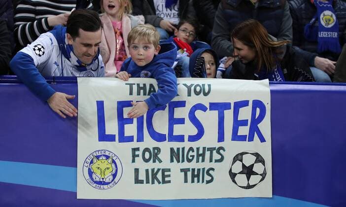 Football - 2016 2017 UEFA Champions League - Round of Sixteen, Second Leg: Leicester City 1 vs. Sevilla 2 Fans of Leicester City celebrate during the match at the King Power Stadium. 