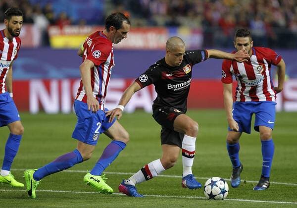 Soccer match between Atletico de Madrid and Beyer Leverkusen of the 2016 2017 Champions League, held at the Vicente Calderon stadium, in Madrid, March 15, 2017. (Photo: J. Luis Cuesta 261 Cordon Press). Godin and Chicharito  xJosexLuisxCuestax xx