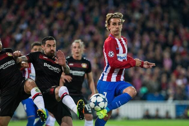 Aleksandar Dragovic of Bayer 04 Leverkusen competes for the ball with -q7- of Atletico de Madrid during the match of Uefa Champions League between Atletico de Madrid and Bayer Leverkusen at Vicente Calderon Stadium in Madrid, Spain. March 15, 2017.  (20170315015)