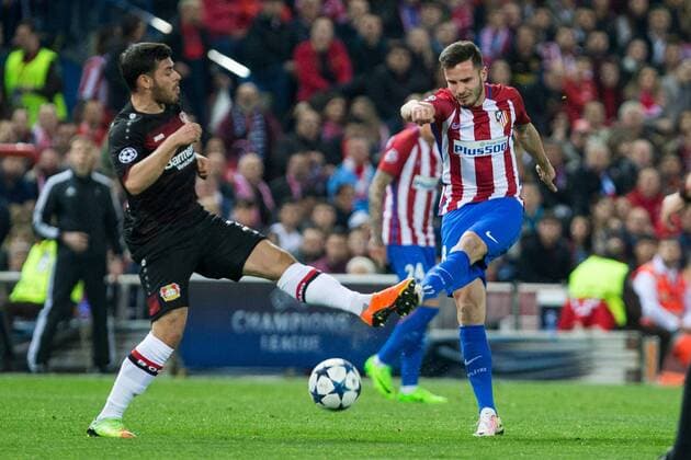 Kevin Volland of Bayer 04 Leverkusen competes for the ball with Koke Resurrecccion of Atletico de Madrid during the match of Uefa Champions League between Atletico de Madrid and Bayer Leverkusen at Vicente Calderon Stadium in Madrid, Spain. March 15, 2017.  (20170315010)