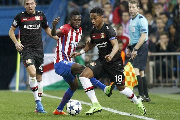 Atletico de Madrid s Thomas Partey (l) and Bayer 04 Leverkusen s Wendell during Champions League 2016 2017 Round of 16 2nd leg match. March 15,2017.  (2017031510)