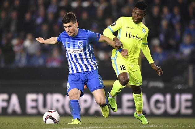 Genk s Ruslan Malinovsky and Gent s Samuel Kalu fight for the ball during the return game of 1 8 finals of the Europa League competition between Belgian soccer team KRC Genk and Belgian club KAA Gent, Thursday 16 March 2017, in Genk. First leg in Gent ended on a 2-5 result. YORICKxJANSENS  x05065781x