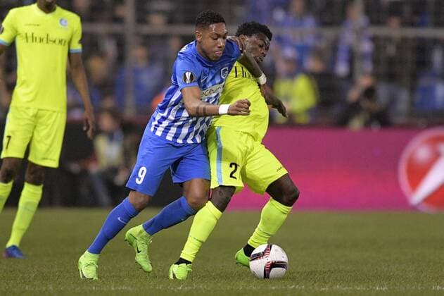 Genk s Jean-Paul Boetius and Gent s Moses Simon fight for the ball during the return game of 1 8 finals of the Europa League competition between Belgian soccer team KRC Genk and Belgian club KAA Gent, Thursday 16 March 2017, in Genk. First leg in Gent ended on a 2-5 result. YORICKxJANSENS  x05065786x