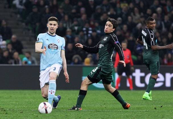 KRASNODAR, RUSSIA - MARCH 16, 2017: Celta de Vigoâ€™s Andreu Fontas (L) and FC Krasnodarâ€™s Mauricio Pereyra fight for the ball in their 2016-17 UEFA Europa League Round of 16 Leg 2 football match at Krasnodar Stadium. Vitaly Timkiv TASS  TS044864
