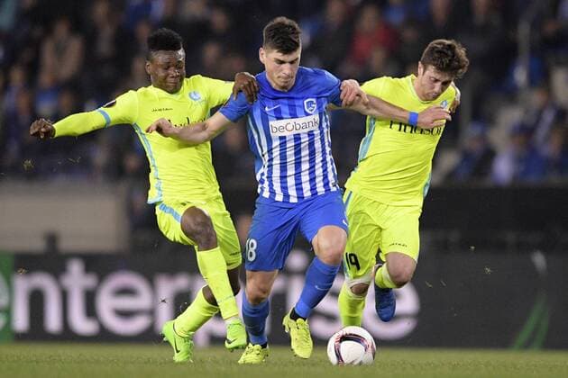 Gent s Samuel Kalu, Genk s Ruslan Malinovsky and Gent s Brecht Dejaegere fight for the ball during the return game of 1 8 finals of the Europa League competition between Belgian soccer team KRC Genk and Belgian club KAA Gent, Thursday 16 March 2017, in Genk. First leg in Gent ended on a 2-5 result. YORICKxJANSENS  x05065837x