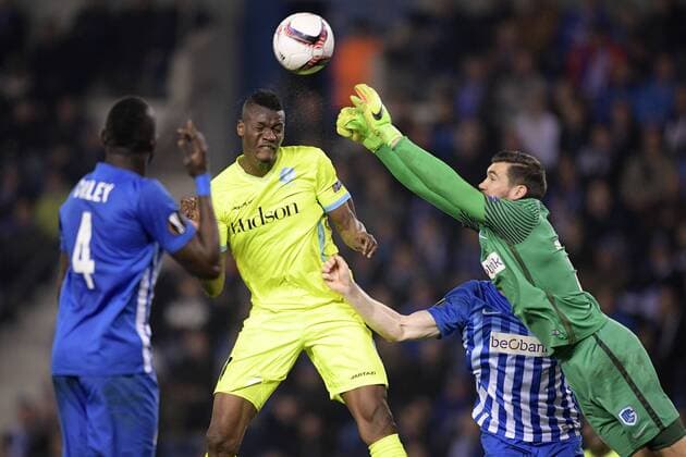 Genk s Omar Colley, Gent s Kalifa Coulibaly and Genk s goalkeeper Mathew Ryan fight for the ball during the return game of 1 8 finals of the Europa League competition between Belgian soccer team KRC Genk and Belgian club KAA Gent, Thursday 16 March 2017, in Genk. First leg in Gent ended on a 2-5 result. YORICKxJANSENS  x05065883x