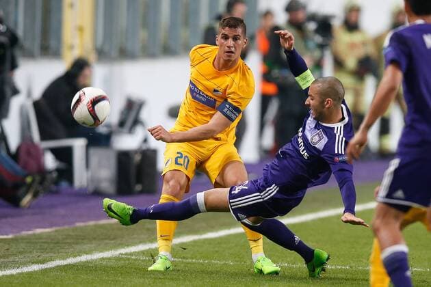 Apoel s Pieros Sotiriou and Anderlecht s Sofiane Hanni fight for the ball during a return 1 8 final game of the Europa League competition between Belgian soccer team RSC Anderlecht and Cyprus team Apoel Nicosie in Anderlecht, Thursday 16 March 2017. First leg in Nicosie ended on a 0-1 result. BRUNOxFAHY  x05065978x