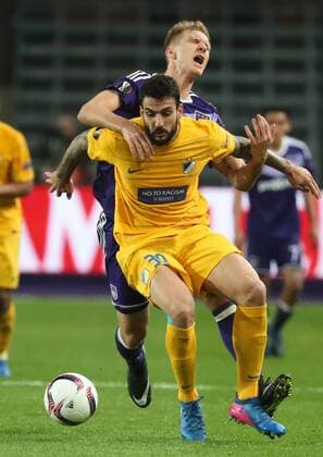 Apoel s Giorgos Merkis and Anderlecht s Lukasz Teodorczyk fight for the ball during a return 1 8 final game of the Europa League competition between Belgian soccer team RSC Anderlecht and Cyprus team Apoel Nicosie in Anderlecht, Thursday 16 March 2017. First leg in Nicosie ended on a 0-1 result. VIRGINIExLEFOUR  x05065981x