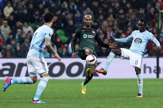 KRASNODAR, RUSSIA - MARCH 16, 2017: FC Krasnodarâ€™s Naldo (C) and Celta de Vigoâ€™s Pione Sisto (R) fight for the ball in their 2016-17 UEFA Europa League Round of 16 Leg 2 football match at Krasnodar Stadium. Celta de Vigo won the game 2-0. Vitaly Timkiv TASS  TS04488F