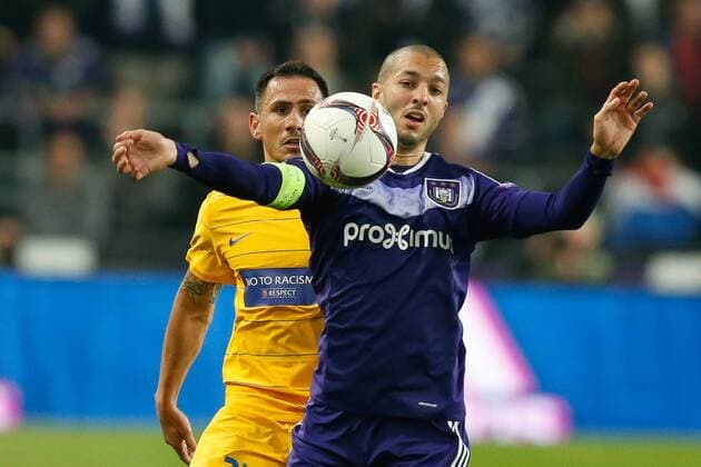 Apoel s Zhivko Milanov and Anderlecht s Sofiane Hanni fight for the ball during a return 1 8 final game of the Europa League competition between Belgian soccer team RSC Anderlecht and Cyprus team Apoel Nicosie in Anderlecht, Thursday 16 March 2017. First leg in Nicosie ended on a 0-1 result. BRUNOxFAHY  x05065985x