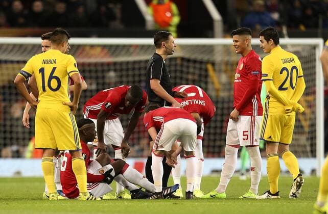 Paul Pogba of Manchester United ManU goes down injured during the UEFA Europa League Round of 16 2nd leg match at Old Trafford Stadium, Manchester. Picture date: March 16th, 2017. Pic credit should read: Matt McNulty Sportimage EDITORIAL USE ONLY. No use with unauthorised audio, video, data, fixture lists, club league logos or live services. Online in-match use limited to 120 images, no video emulation. No use in betting, games or single club league player publications.