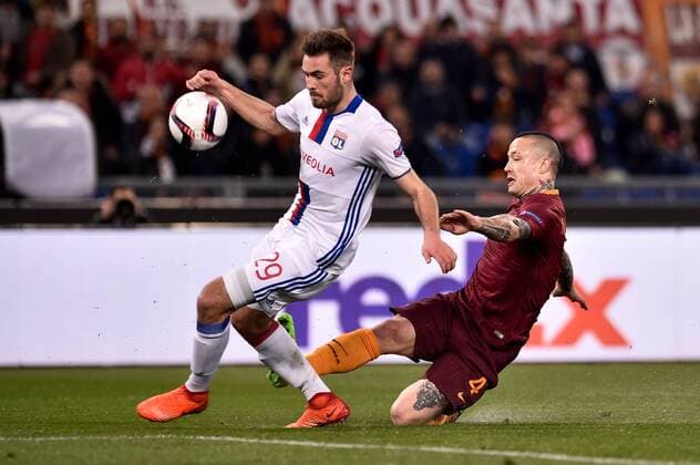 Radja Nainggolan of AS Roma is challenged by Lucas Tousart of Olympique Lyonnais during the UEFA Europa League match between Roma and Olympique Lyonnais at Stadio Olimpico, Rome, Italy on 16 March 2017. Copyright: xGiuseppexMaffiax 14640026