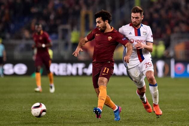 Mohamed Salah of AS Roma is challenged by Lucas Tousart of Olympique Lyonnais during the UEFA Europa League match between Roma and Olympique Lyonnais at Stadio Olimpico, Rome, Italy on 16 March 2017. Copyright: xGiuseppexMaffiax 14640034