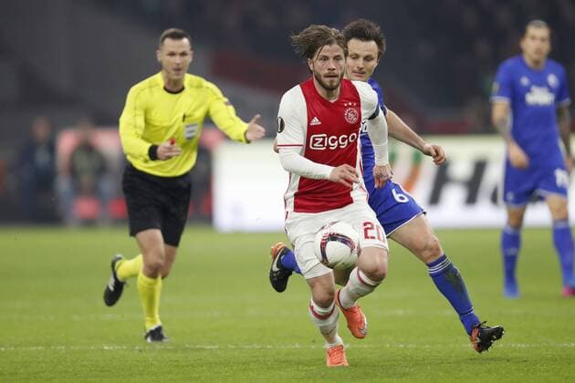 (L-R) referee Ivan Kruzliak, Lasse Schone of Ajax, William Kvist of FC Copenhagenduring the UEFA Europa League round of 32 match between Ajax Amsterdam and FC Copenhagen at the Amsterdam Arena on March 16, 2017 in Amsterdam, The Netherlands Ajax v FC Kopenhagen UEFA Europa League 2016 2017 xVIxxIVx 7354463
